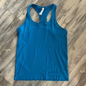 Excellent used condition swiftly tech Razorback tank from Lululemon.